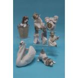 A collection of eight various Lladro ornaments