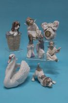 A collection of eight various Lladro ornaments