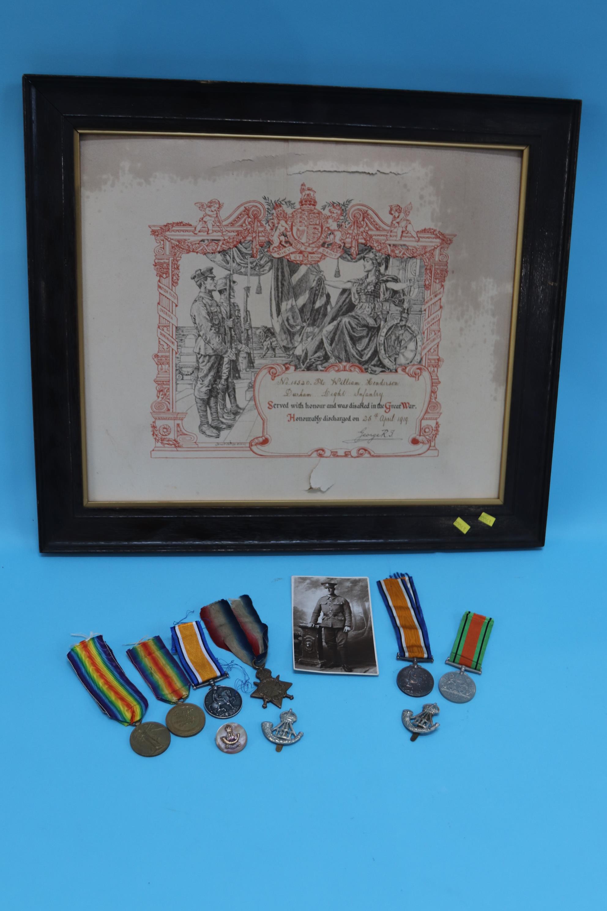 A collection of First World War medals and ephemera to PTE W. Henderson,15520, Durham Light Infantry