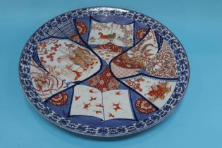 A very large Japanese Imari wall charger, diameter 59cm
