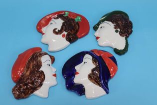 Three Moorland Art Deco style wall masks and five various wall masks