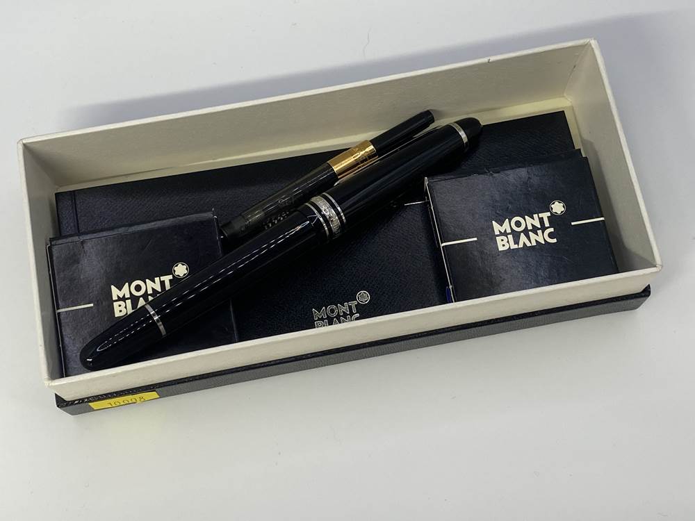 A boxed Montblanc Meisterstuck fountain pen, with refills and paperwork