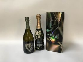 A bottle of Dom Perignon 'Lady Gaga', limited edition, 2010, boxed champagne and a bottle of Perrier