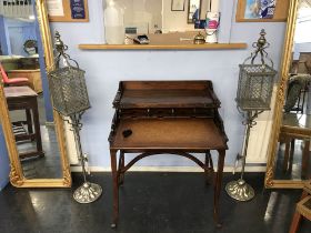 Pair of metalwork Hurricane lamps, on stands