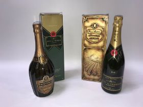 A bottle of 1992, Moet & Chandon and a bottle of 1976, Rene Lalou champagne (2)