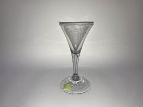 A collection of various 19th century clear glass wine, toasting and liquor glasses