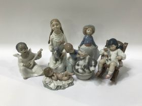 Three pieces of Lladro and three Nao figures