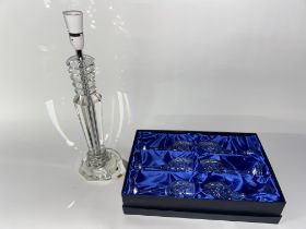 A cut glass faceted table lamp and a boxed set of six Bohemian crystal wine glasses