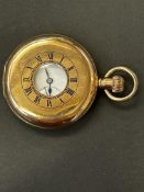 Gold plated half hunter pocket watch currently tic