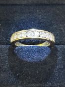 Iliana 18ct Gold half eternity ring set with 11 di