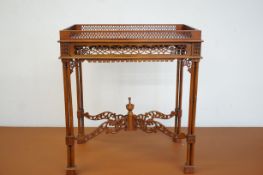 An early 20th century pierced gallery side table