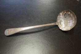 Unmarked white metal ladle Length 32 cm Weight 209