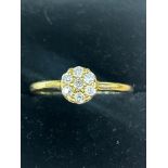 18ct Gold ring set with 7 diamonds Weight 2.3g Siz