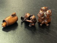 Three finely carved wooden netsuke, all signed