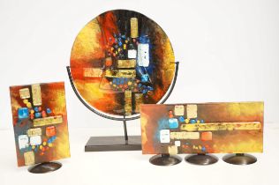 Three art glass plaques, tallest 39cm