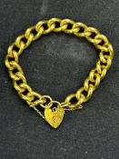 9ct Gold bracelet with safety chain & heart shaped