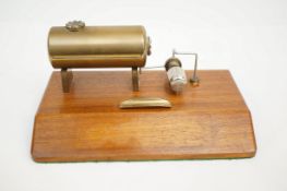 A brass steam boiler pen tray