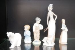 Three Lladro figurines together with to Nao figuri
