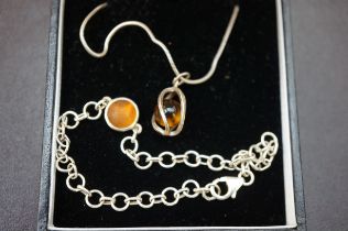 Boxed silver and amber necklace and bracelet
