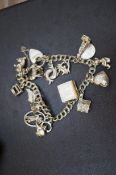 Silver charm bracelet with 15 charms