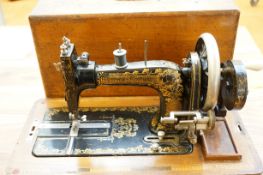 An early Frister and Rossmann hand sewing machine