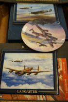 Box of spitfire related items to include plaques,