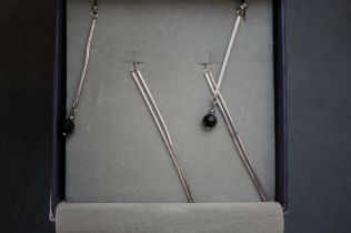 Two pairs of boxed silver earrings