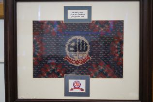 Framed authentic carpet from the boardroom at Burd