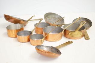 Collection of small copper pans
