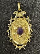 15ct Gold photo locket set with amethyst & seed pe