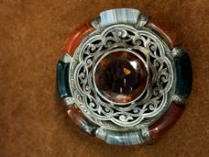 White metal kilt brooch set with agate