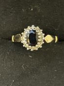 9ct Gold ring set with sapphire & diamonds Size M