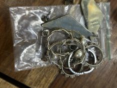 Bag of silver earrings