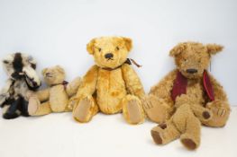 Charlie bear together with 4 others