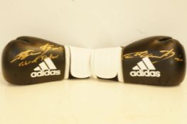 Pair of Adidas boxing gloves 12 ounce, both signed
