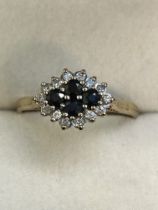 9ct Gold ring set with 4 sapphires & 14 diamonds S