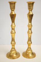 Pair of large brass candle sticks Height 60 cm