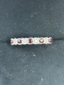 9ct Gold ring set with rubies & diamonds Size O 1.