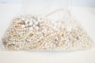 Bag of pearl necklaces