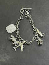 Silver charm bracelet with 5 charms