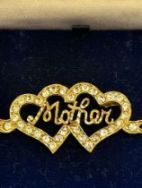 Boxed silver gilt mother brooch