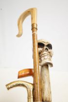 Shepherds walking sticks, carved skull walking sti