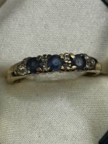 9ct Gold diamond & sapphire ring in box Size P.5