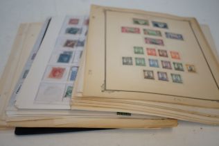 Many loose pages of commonwealth & other stamps