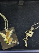 Two Swarovski chains and pendants