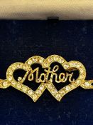 Boxed silver gilt mother brooch