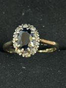 9ct Gold ring set with sapphires & diamond Size K