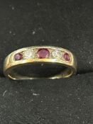 9ct Gold ring set with rubies & diamonds Size M 3g