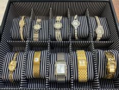 Collection of 10 ladies watches in display case