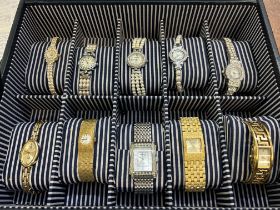 Collection of 10 ladies watches in display case